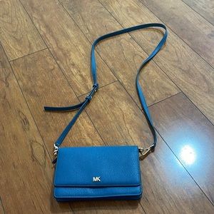 Michael Kors Pebble crossbody wallet. Never used.